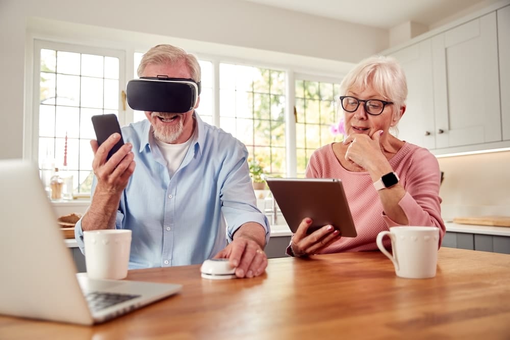 retired,senior,couple,in,at,home,using,digital,tablet,vr