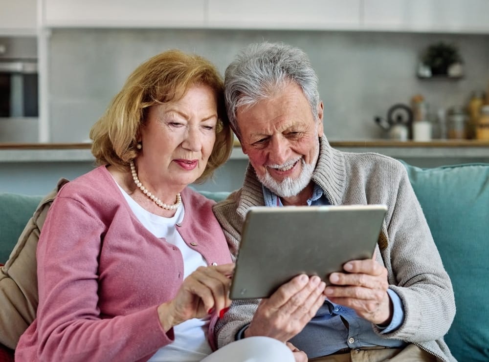 portrait,of,a,lovely,senior,mature,couple,together,holding,a