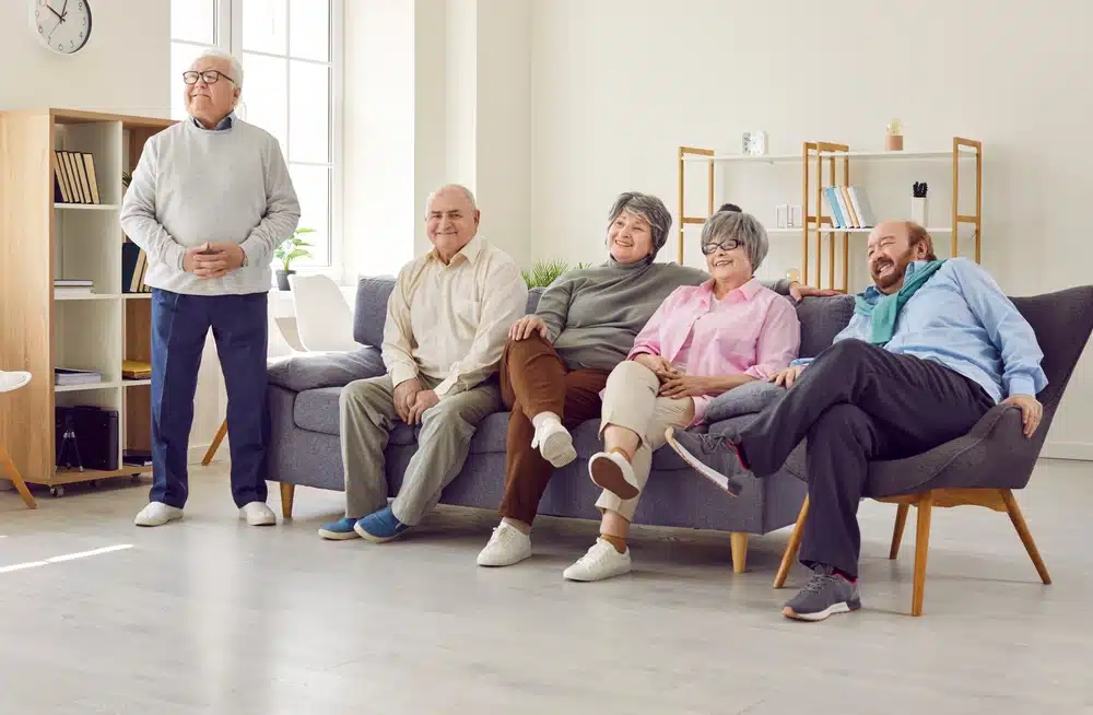 happy,senior,family,members,or,patients,watching,tv,and,enjoying