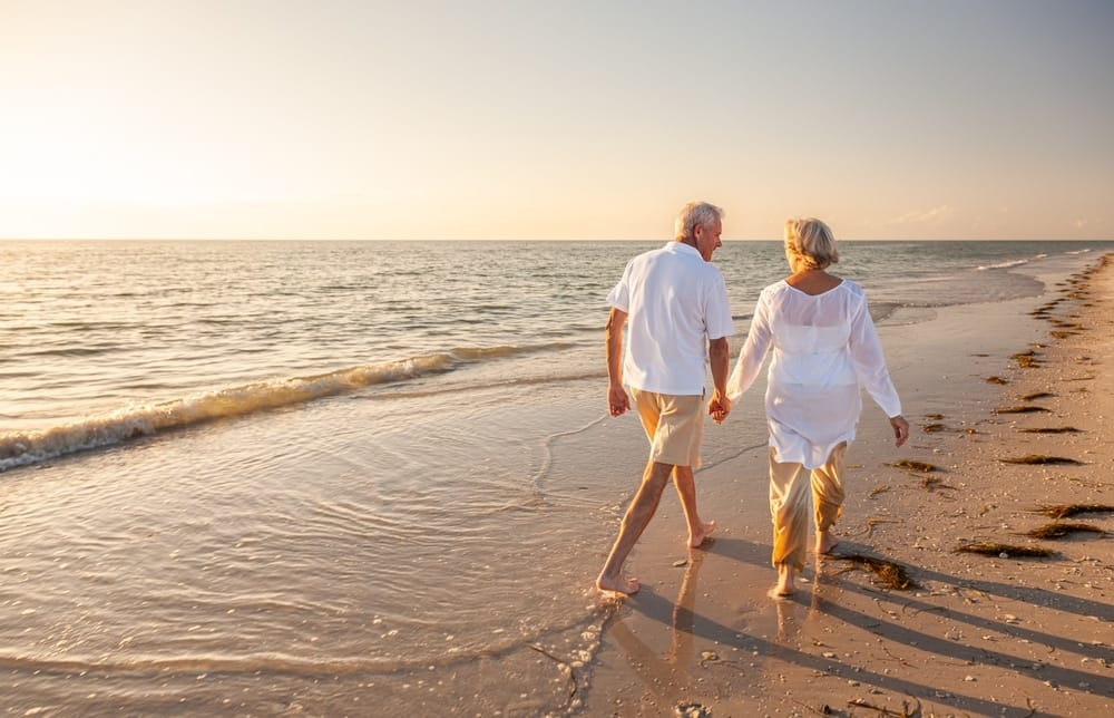happy,senior,man,and,woman,old,retired,couple,walking,and